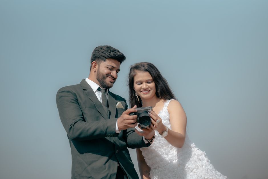 Professional wedding photographer in action